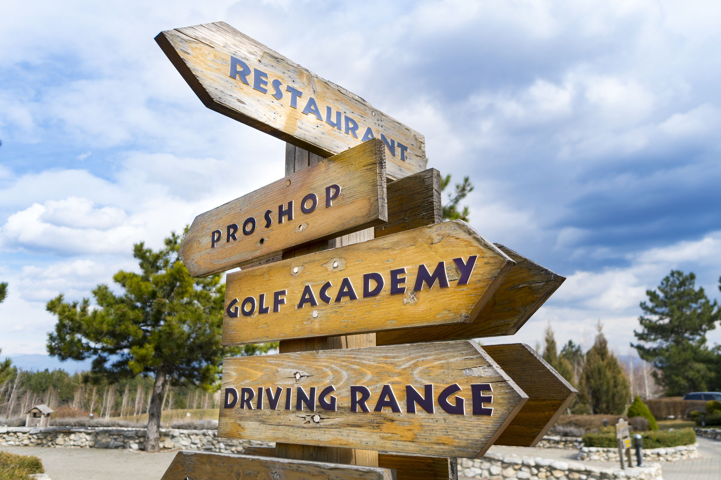 Directional signs at a golf facility